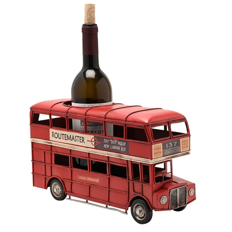 Red metal Double Decker London Bus wine bottle holder with Routemaster signage, open windows, silver grille, headlamps and black tyres, wine bottle inserted through the roof opening.