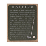 Wooden golf plaque with green panel and natural wood frame, featuring white "Golfing" text and a raised metal club with ball, on a plain background.
