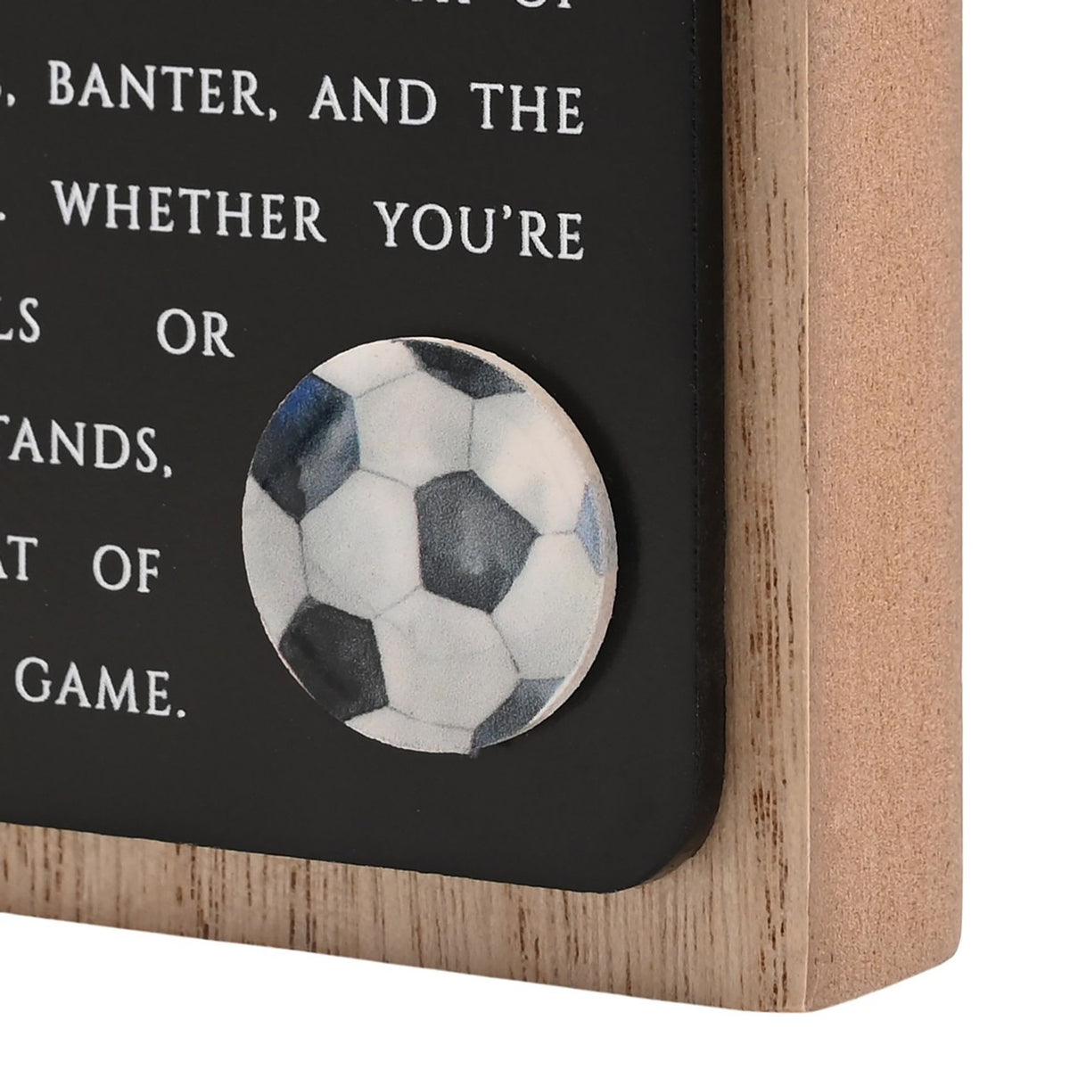 Close-up of the Football Wooden Plaque in natural wood frame with black panel, white printed text, and a round football motif detail in the corner.
