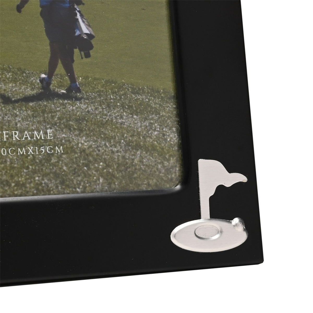 Close-up of the Golf Flag Matt Metal Photo Frame's corner, showing a matt black finish and a small silver golf flag with ball emblem beside a 6 x 4in photo.