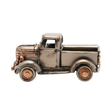 Vintage Pickup Truck Metal Ornament Figurine in silver with copper-tone grille, headlamps and hubcaps, shown in side profile on a plain white background.