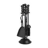 Hill Interiors Black Fireside Companion Set with poker, brush, shovel and tongs on a matt black metal stand with round base, shown on white.