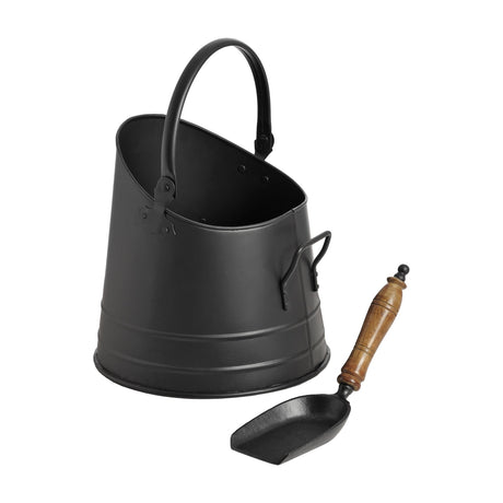 Hill Interiors black metal coal bucket with arched handle and side loop, paired with a teak-handled shovel, on a plain white background.