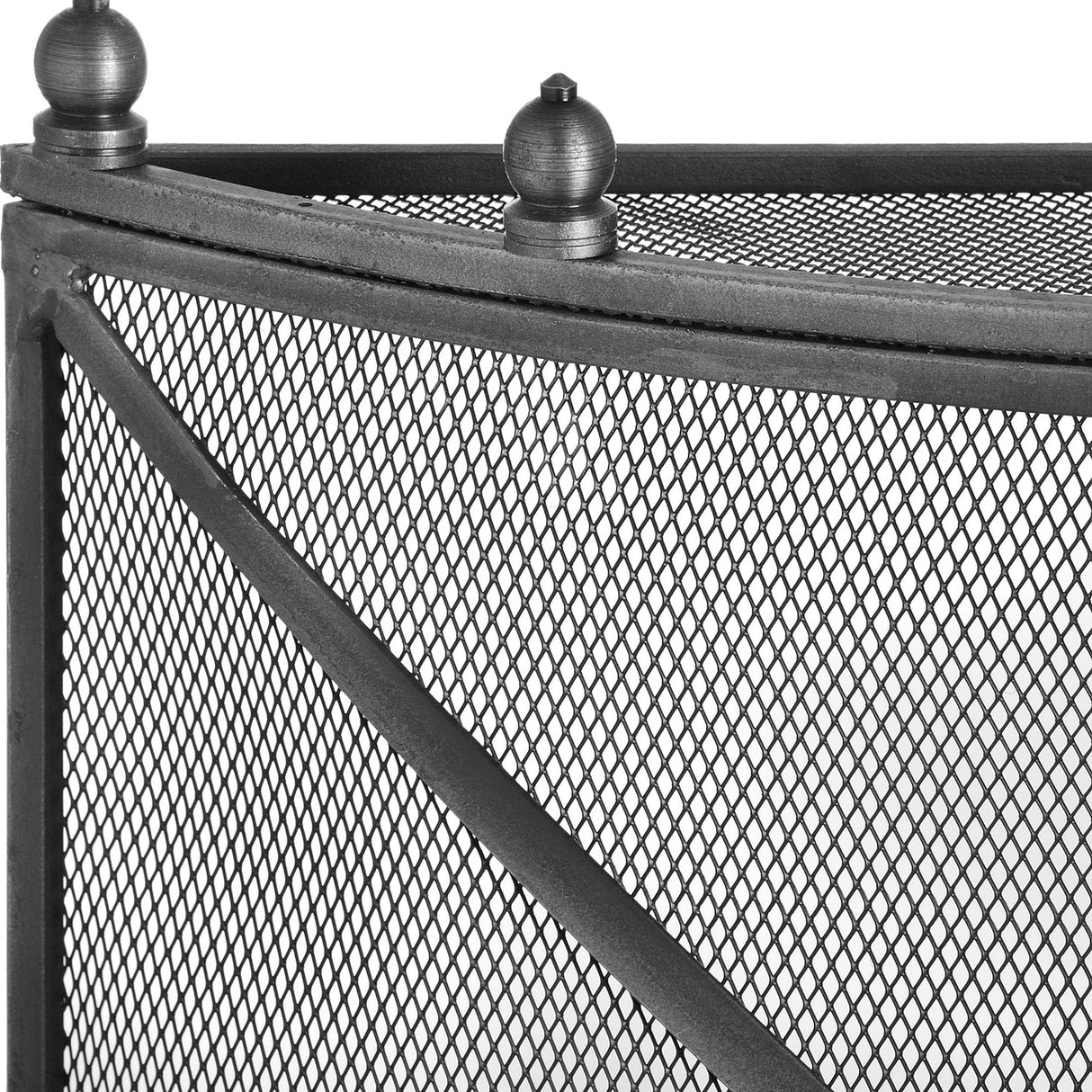 Close-up of Hill Interiors mesh fireguard in antique pewter effect finish, showing corner frame, fine diamond mesh panels and rounded ball finials.