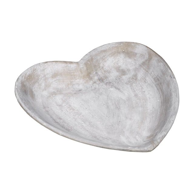 Hill Interiors Stone Heart Dish in beige, a shallow heart-shaped stone bowl with a mottled natural finish, shown on a plain white background.