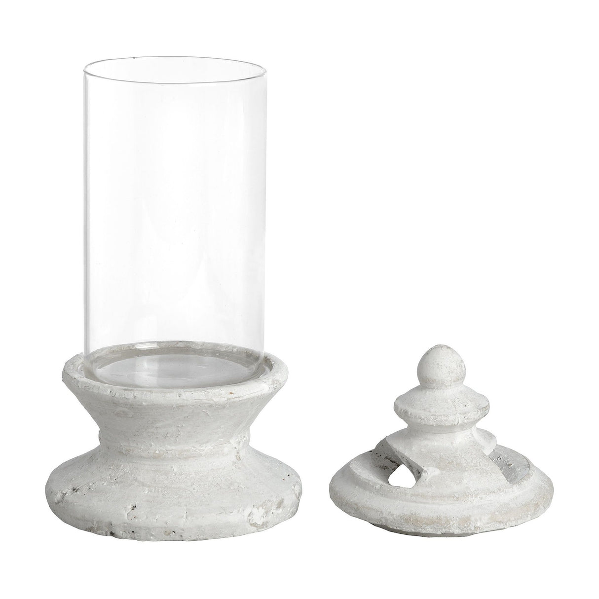 Hill Interiors Glass and Stone Pillar Candle Holder in white with a clear glass hurricane and matte stone base shown with finial lid detached.