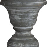 Close-up of the turned wooden base on the Hill Interiors Wooden Floor Lamp, showing an urn-shaped column with a distressed beige finish and visible grain.