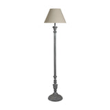 Hill Interiors wooden floor lamp with turned beige column, matching fabric drum shade and round base, shown against a plain white background.