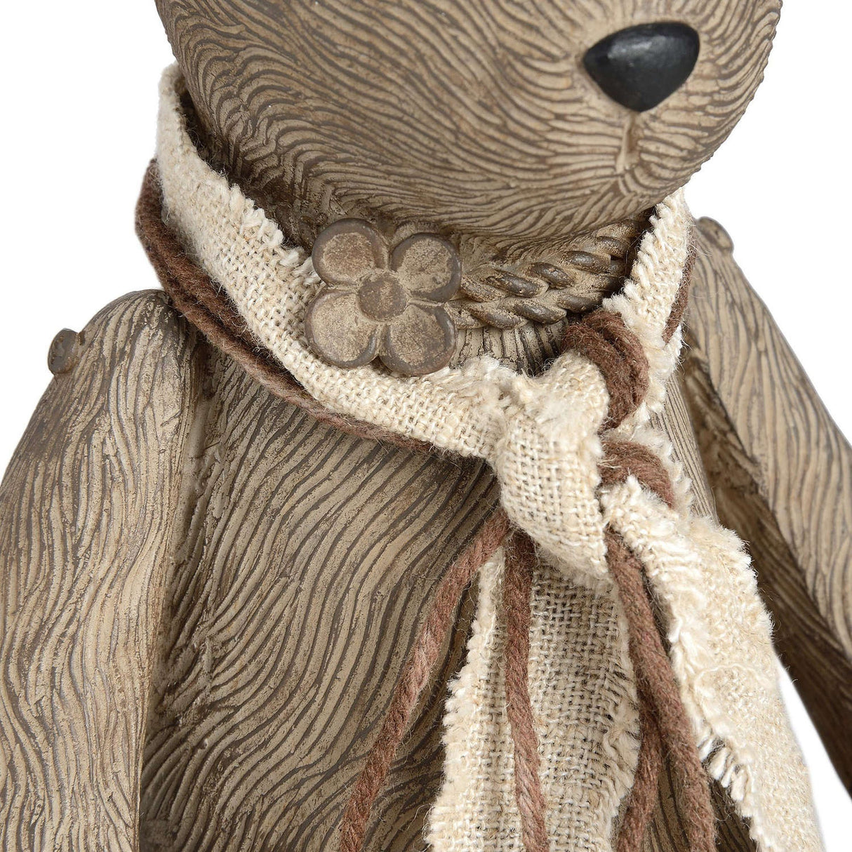 Close-up of Hill Interiors Large Winter Bunny Rabbit Figurine in brown resin, showing carved fur texture, flower detail and a woven cream and brown scarf.