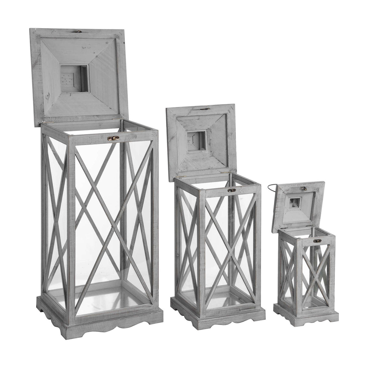 Hill Interiors set of three wooden lanterns in grey with cross-section glazed panels and hinged tops open, shown in graduated heights on a white background.