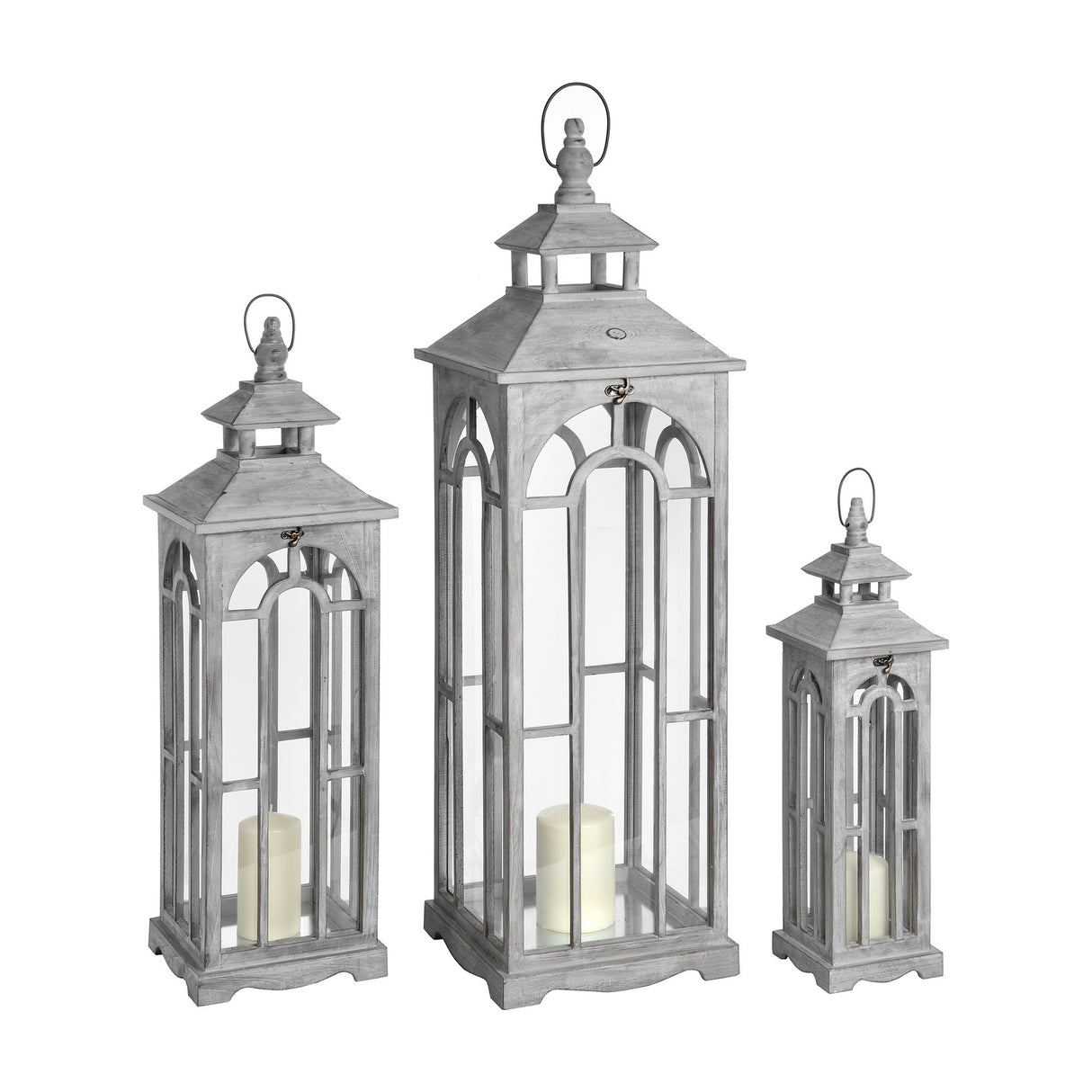 Hill Interiors Set of Three Wooden Archway Lanterns in grey, graduated sizes with arched window panels, pillar candles inside, on a white background.