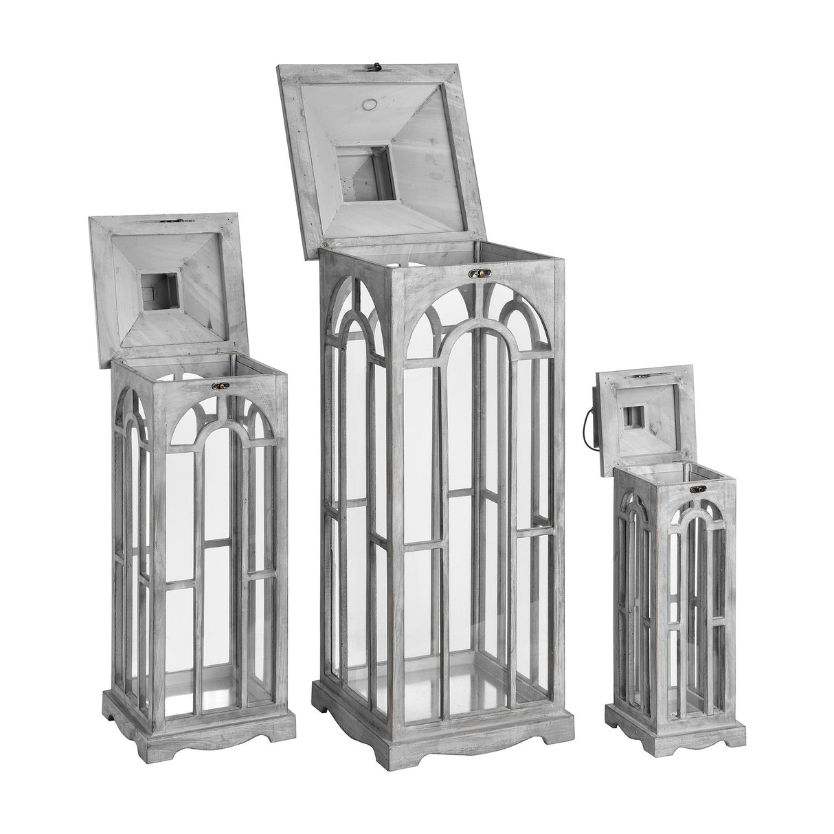 Hill Interiors set of three grey wooden archway lanterns graduated in height with hinged lids open, shown on a plain white background.