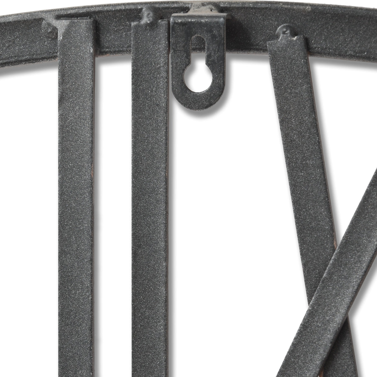 Close-up of the Hill Interiors Large Silver Skeleton Wall Clock showing the metal frame edge, vertical bars, and keyhole hanging bracket.