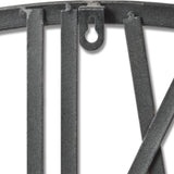 Close-up of the Hill Interiors Large Silver Skeleton Wall Clock showing the metal frame edge, vertical bars, and keyhole hanging bracket.