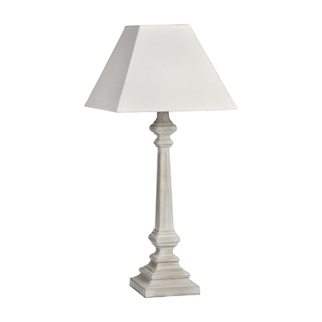 Hill Interiors Wooden Table Lamp in white with a tapered turned column base, stepped square foot and tapered square fabric shade, on a plain background.