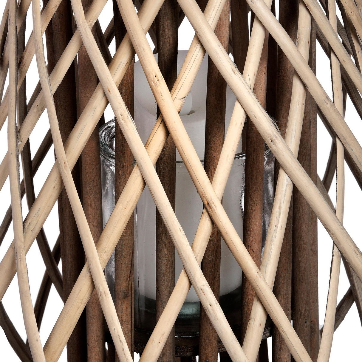 Close-up of Hill Interiors Large Bulbous Wicker Lantern in brown, showing the diamond-woven rattan strands around a glass insert holding a pillar candle.