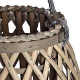 Close-up of Hill Interiors Large Bulbous Wicker Lantern in brown, showing woven rim, criss-cross rattan body and braided rope handle detail.