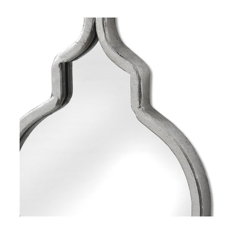 Close-up of the Hill Interiors Silver Quatrefoil hanging wall mirror showing the metal frame's curved silver-finish top lobe against a white background.