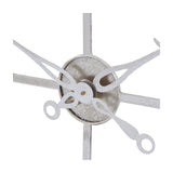 Close-up of the Hill Interiors Large Skeleton Wall Clock centre, showing silver foil metal hands, spoke frame and circular hub against a white background.