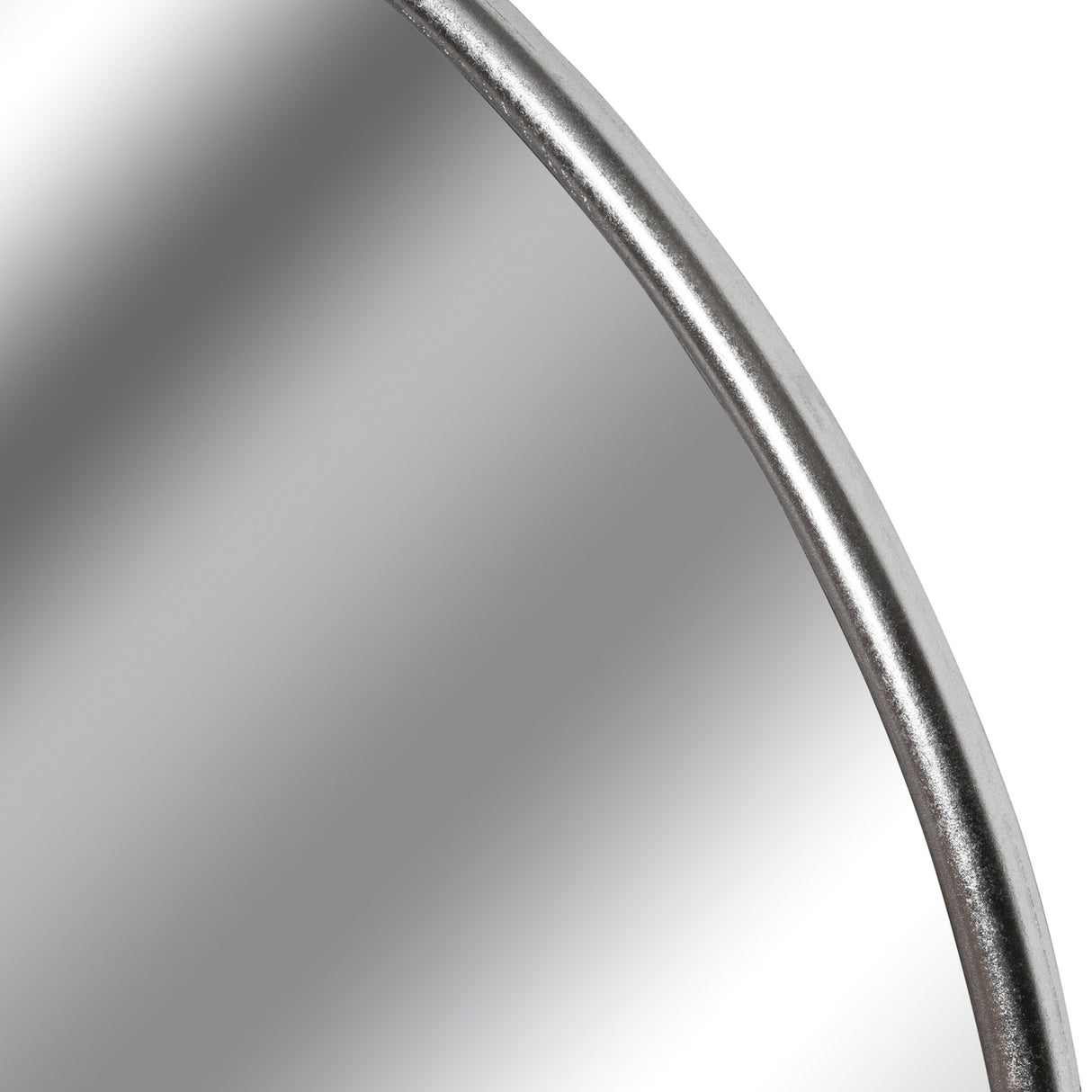 Close-up of the Hill Interiors Large Circular Metal Wall Mirror in silver, showing the slim curved metal frame with soft foil finish against reflected glass.
