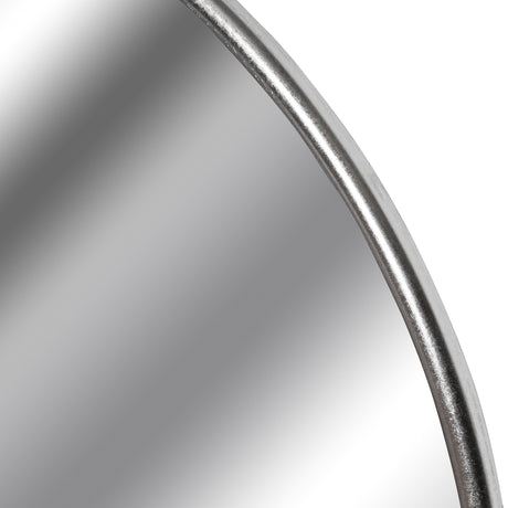 Close-up of the Hill Interiors Large Circular Metal Wall Mirror in silver, showing the slim curved metal frame with soft foil finish against reflected glass.