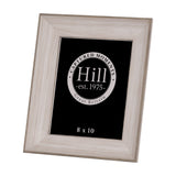 Hill Interiors white washed solid wood 8x10 photo frame with visible grain, shown at an angle on a plain white background.