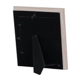 Back view of Hill Interiors White Washed Wood Photo Frame showing black backing board, hanging fixings and fold-out easel stand on a white background.