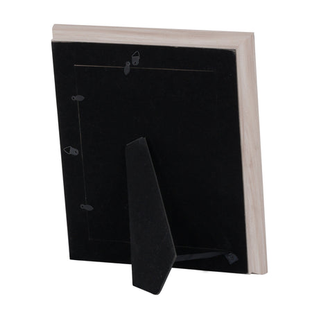 Back view of Hill Interiors White Washed Wood Photo Frame showing black backing board, hanging fixings and fold-out easel stand on a white background.