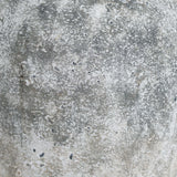 Close-up of the Hill Interiors Aged Stone Ceramic Vase in beige, showing the mottled, matte stone-effect finish with grey and white weathered texture.