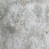 Close-up of Hill Interiors Tall Ceramic Vase showing the aged stone finish in beige with chalky matte texture and subtle warm and cool tonal variation.