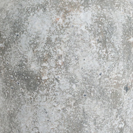 Close-up of Hill Interiors Tall Ceramic Vase showing the aged stone finish in beige with chalky matte texture and subtle warm and cool tonal variation.