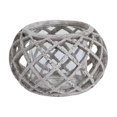 Hill Interiors round ceramic lattice hurricane lantern in beige with a glass insert, shown on a plain white background.