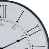 Close-up of Hill Interiors Large Station Wall Clock in white, showing bold black Roman numerals, inner 24-hour markings, slim hands and a black wooden frame.