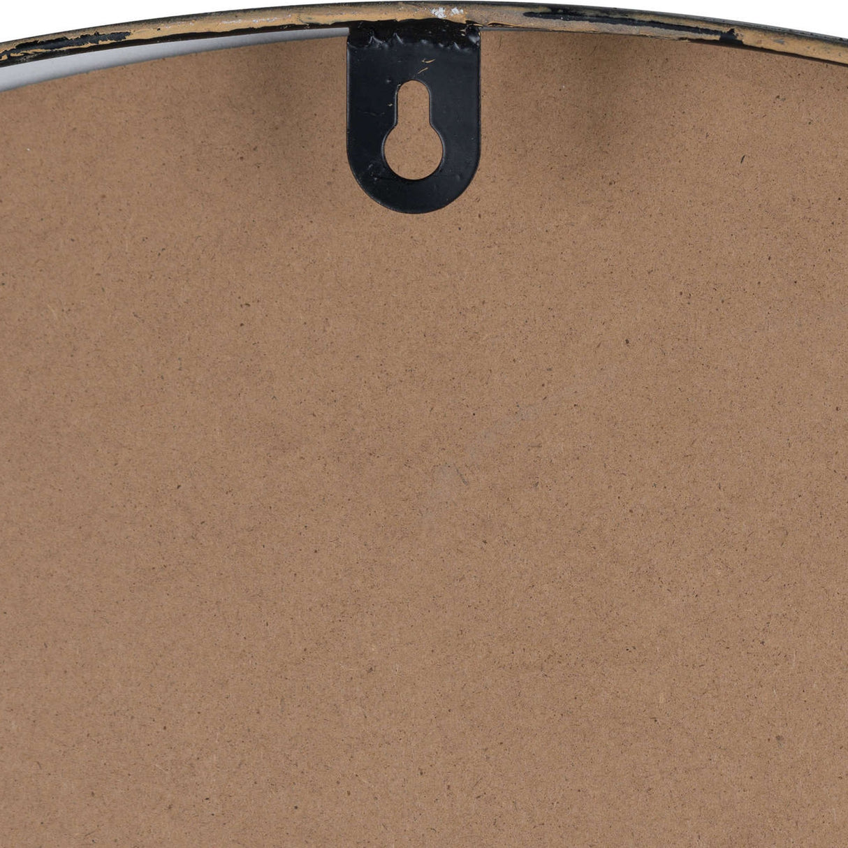 Close-up of the reverse of the Hill Interiors Large Station Wall Clock showing the brown backing board and black metal keyhole hanging bracket.