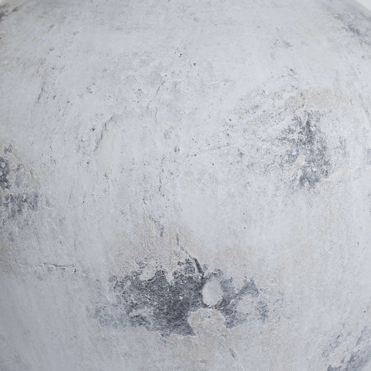 Close-up of the Hill Interiors Large Antique White Ceramic Vase showing its matte chalky glaze with soft grey weathered patches across the rounded body.
