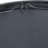 Close-up of the Hill Interiors Large Brass and Black Round Wall Clock showing the rear fixing loop, black backing and metal rim detail.