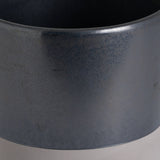 Close-up of Hill Interiors Large Metallic Ceramic Serving Tray in grey, showing the glazed cylindrical body with soft metallic sheen on a pale background.