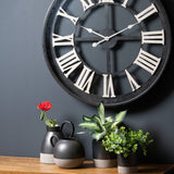 Hill Interiors Large Metallic Ceramic Serving Tray in grey styled with ceramic jugs, potted greenery and a red poppy beneath a Roman numeral wall clock.