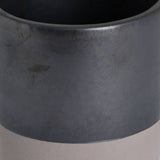 Close-up of Hill Interiors Metallic Ceramic Serving Tray in grey, showing its cylindrical form and mottled metallic glaze on a pale background.