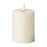 Hill Interiors LED Wax Pillar Candle 10cm in cream with a short rounded pillar form and realistic flame-shaped LED tip, shown on a white background.