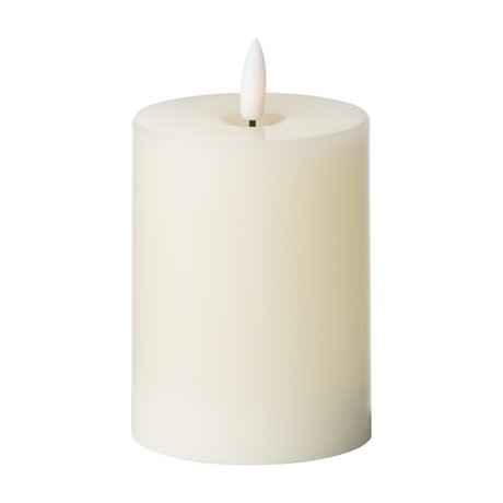 Hill Interiors LED Wax Pillar Candle 10cm in cream with a short rounded pillar form and realistic flame-shaped LED tip, shown on a white background.