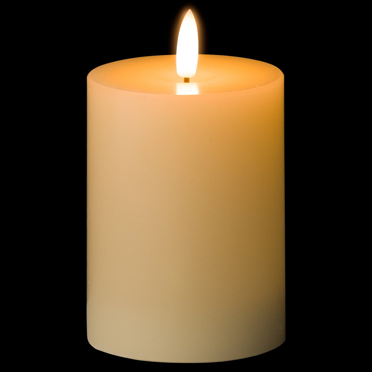 Hill Interiors LED Wax Pillar Candle 10cm in cream with a realistic flickering flame, shown against a plain black background.