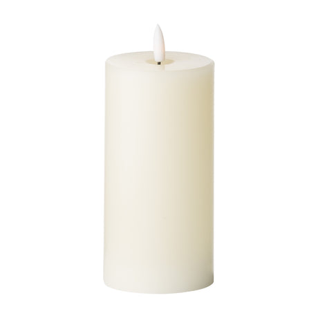 Hill Interiors LED pillar candle in cream wax effect with moulded top and steady flame-shaped LED tip, 15cm tall, shown on a plain white background.