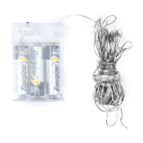 Hill Interiors 100 LED battery micro string lights coiled on a fine silver wire beside a transparent three-AA battery pack on a white background.