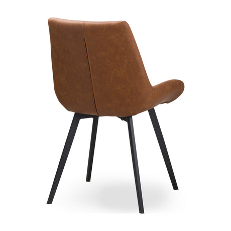 Hill Interiors Draxinby faux-leather dining chair in tan brown with a curved padded back and seat on splayed black metal legs, rear angled view.