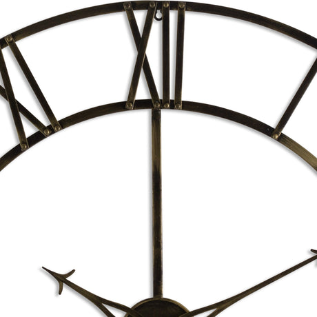 Close-up of Hill Interiors Large Antique Brass Skeleton Wall Clock showing openwork frame, riveted spokes and Roman numeral XII on white.