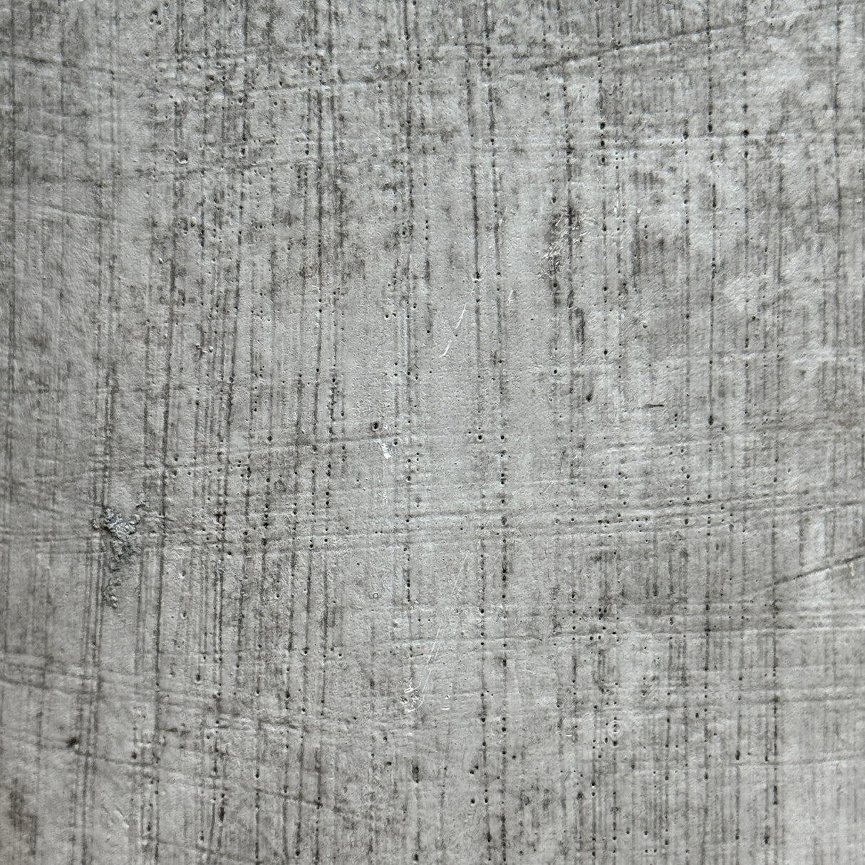 Close-up of the Hill Interiors urn-shaped ceramic vase showing its beige stone-effect finish with soft matte texture and subtle vertical mottling.