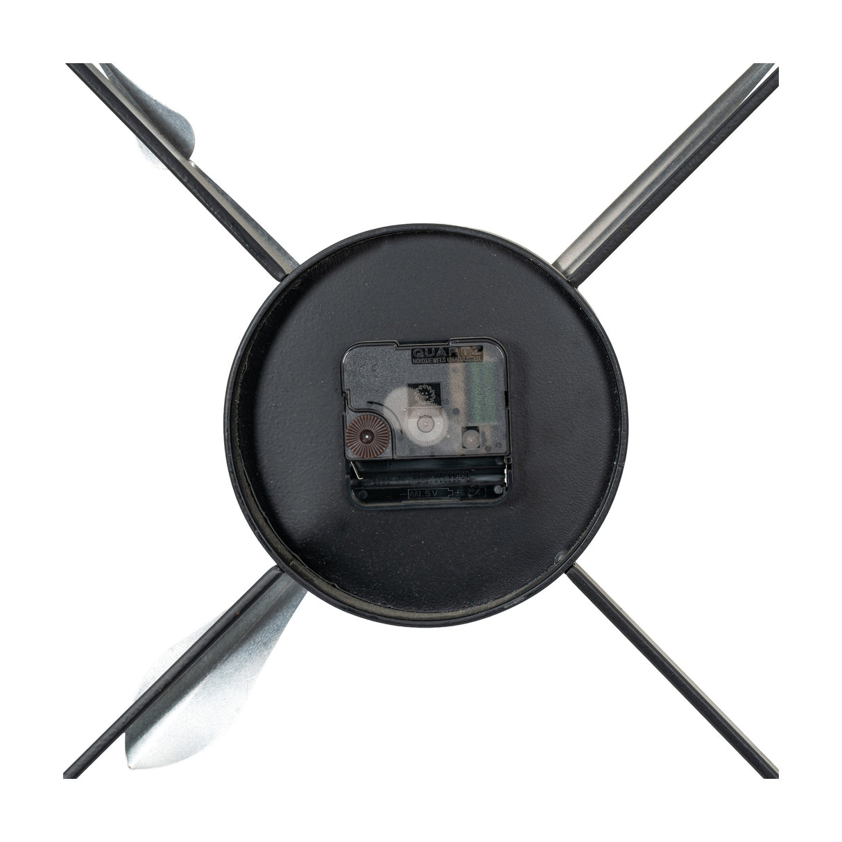 Close-up of the Hill Interiors black and gold skeleton metal wall clock's rear quartz movement housing, with slim metal arms extending outward.