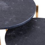 Close-up of Hill Interiors Set of 2 Gold and Black Marble-Effect Side Tables, showing the veined black stone-effect tops and gold-toned metal frames.