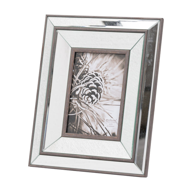 Hill Interiors 5x7in photo frame with a brown wooden surround and slim mirrored border, displaying a pinecone image, shown upright on a white background.